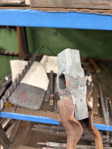 The hammer now has defined shoulders in the center and more developed faces